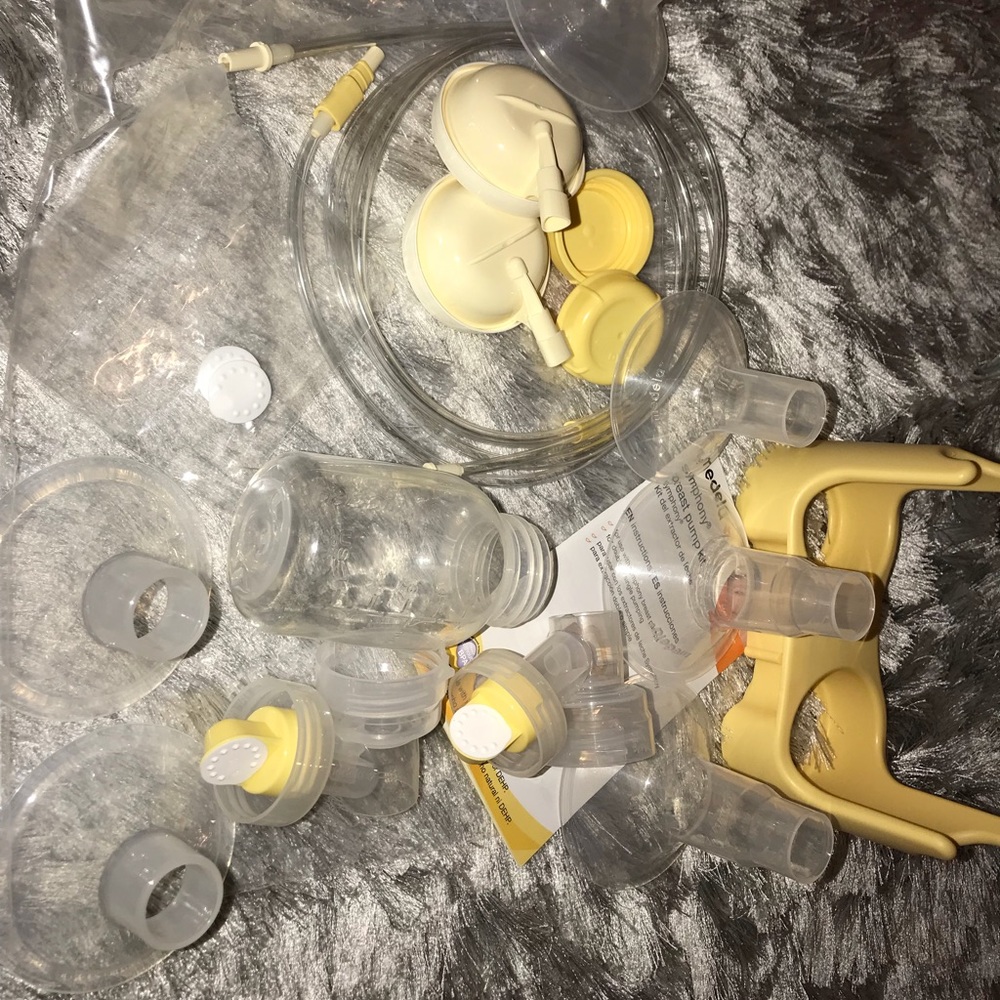 Medela Symphony parts with bottles extras